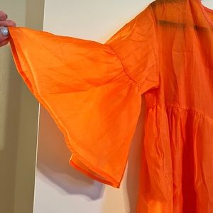 Oversized loose dress in a bright orange color